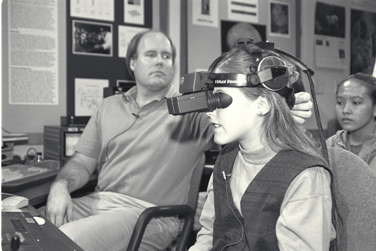 'Life from other Worlds' with McNair Middle School TROV robot explores under Antarctic ice - image during demo Ames reseacher Bob Hine leads students operating TROV