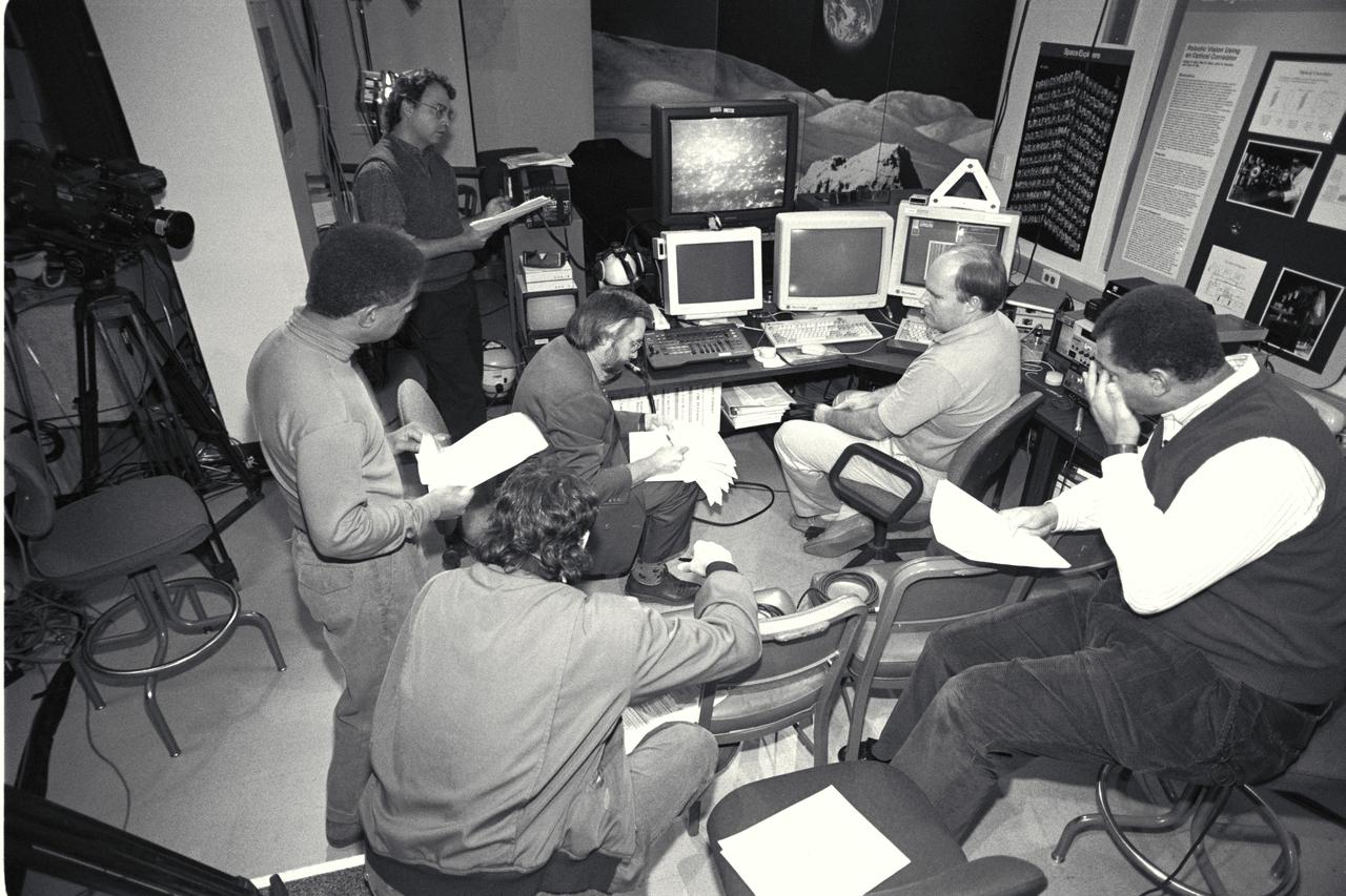 'Life from other Worlds' with McNair Middle School TROV robot explores under Antarctic ice - image during demo Ames reseacher Bob Hine leads students operating TROV