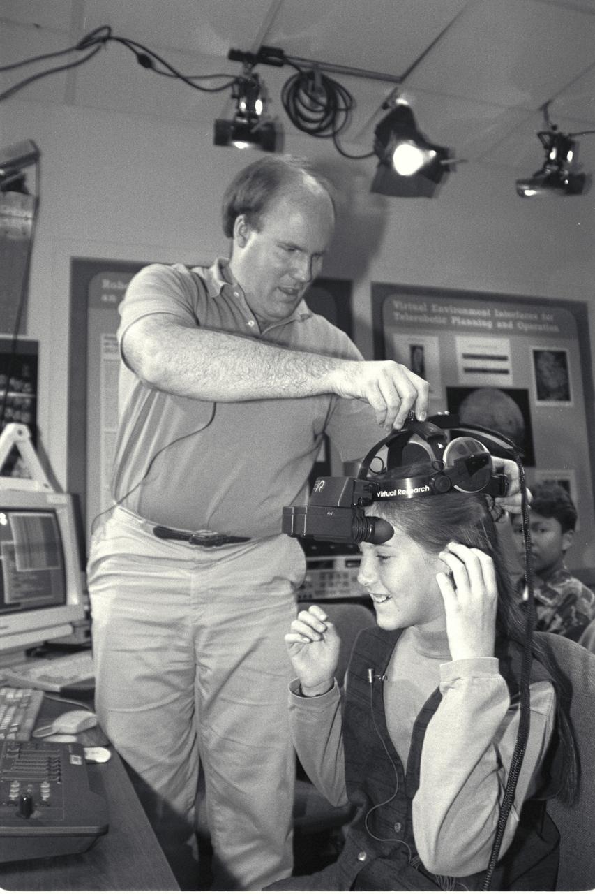 'Life from other Worlds' with McNair Middle School TROV robot explores under Antarctic ice - image during demo Ames reseacher Bob Hine leads students operating TROV