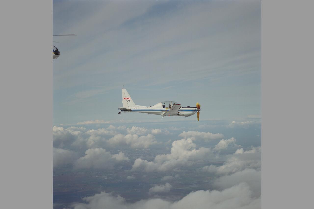 YO-3A during in flight rotorcraft acoustics program Distance Versus Noise Calibration test on BO-105 over Livermore - Central Valley, CA