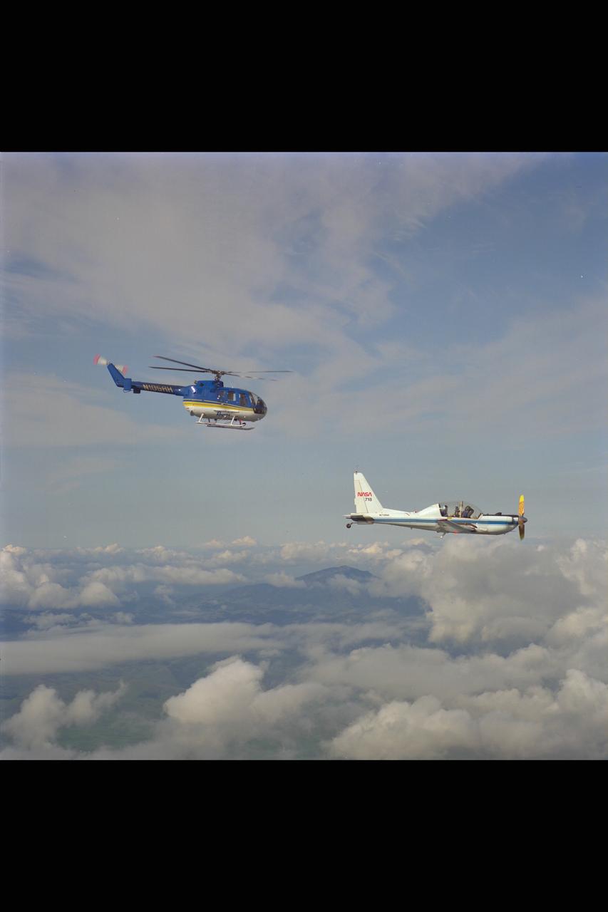 YO-3A (NASA-718) & BO-105 helicopter over Livermore Valley for in flight Rotorcraft Acoustics Program - distance versus noise calibration