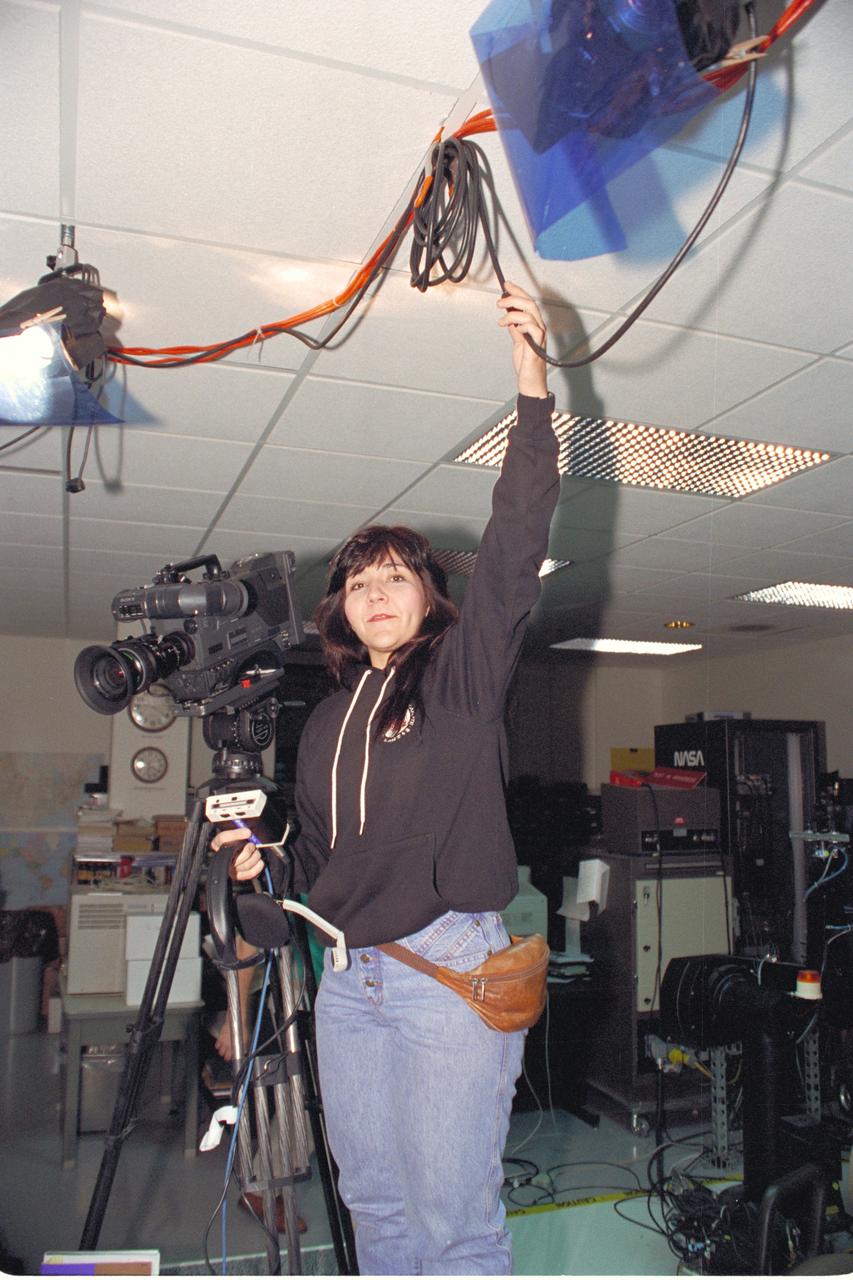 'Life from other Worlds' with McNair Middle School TROV robot explores under Antarctic ice - image shows Machelle Bowers during video set-up