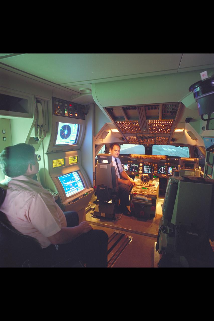 N-257 MVSRF, Boeing 747 simulator; cockpit and Navigators station with Barry Sullivan & Robert Shiner