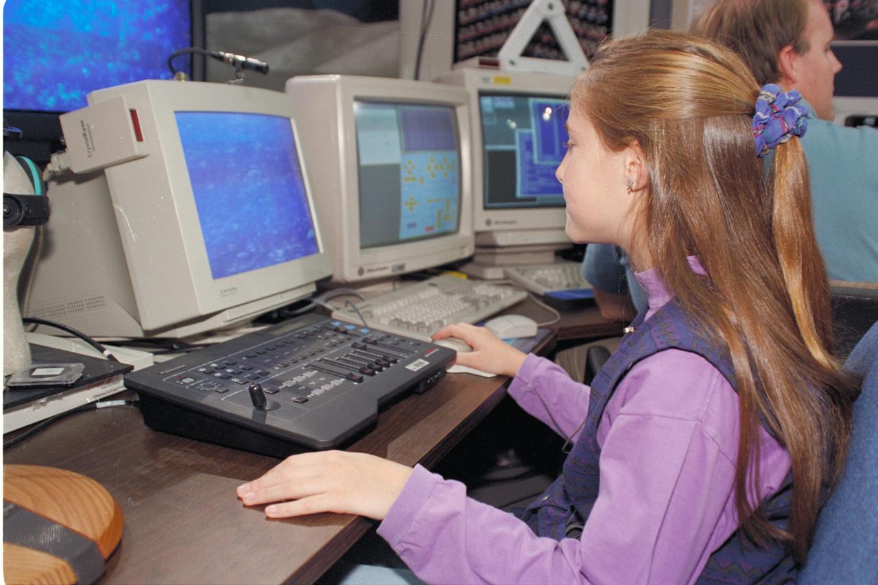Life from other Worlds'  with McNair Middle School TROV robot explores under Antarctic ice-image during demo with students operating TROV