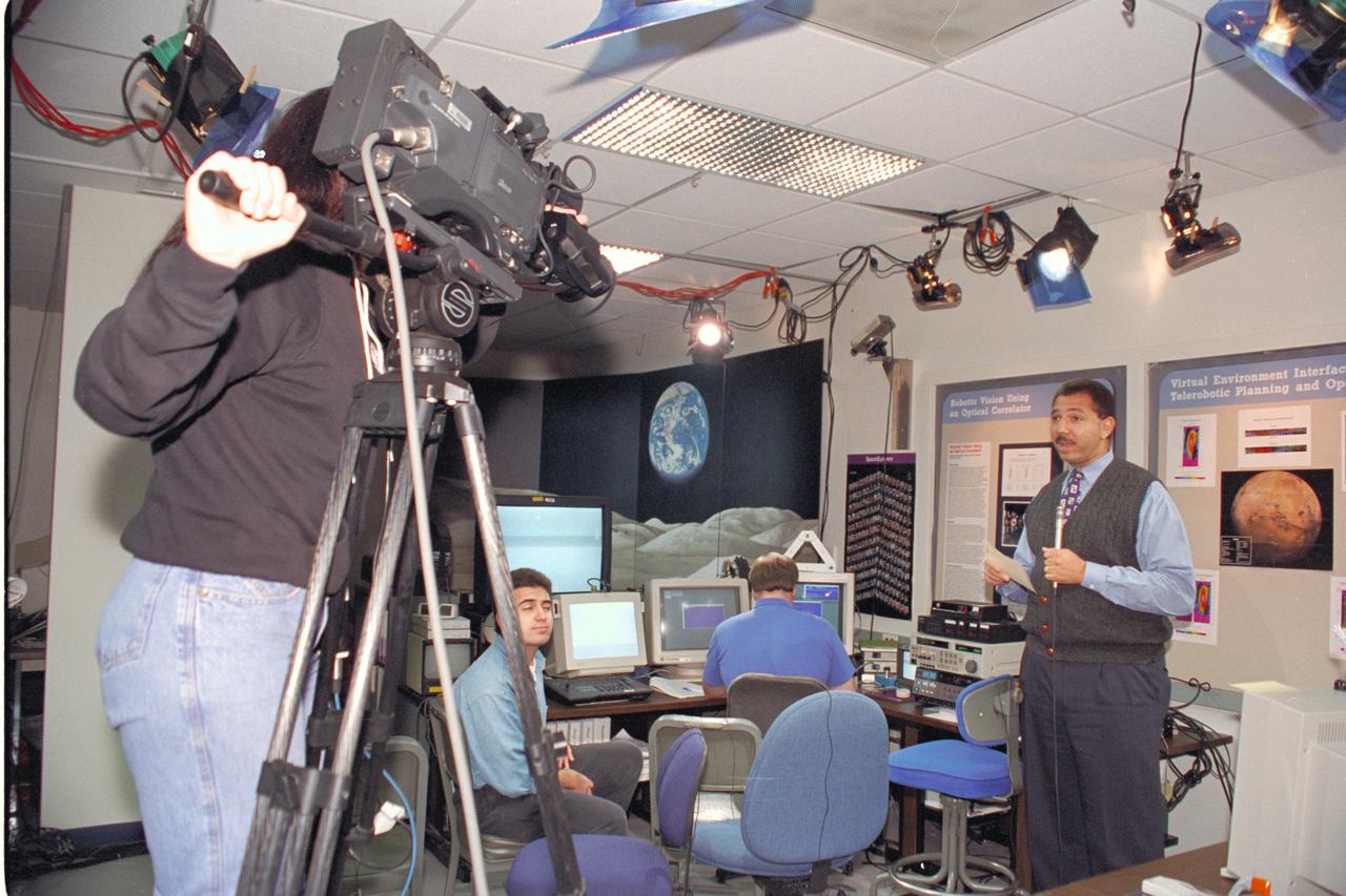 Life from other Worlds'  with McNair Middle School TROV robot explores under Antarctic ice-image during demo with students operating TROV
