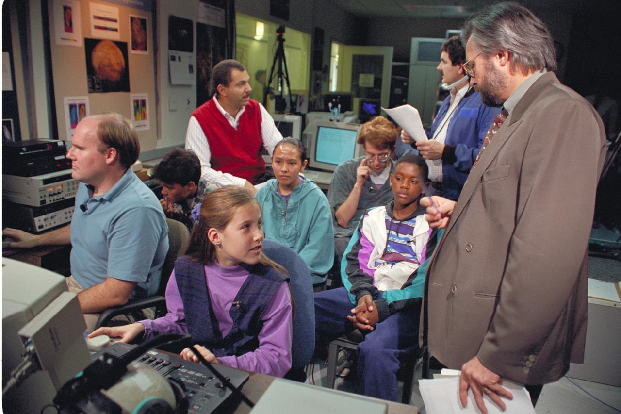 Life from other Worlds'  with McNair Middle School TROV robot explores under Antarctic ice-image during demo with students operating TROV