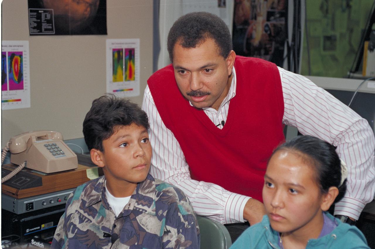 Life from other Worlds' with McNair Middle School TROV robot explores under Antarctic ice - image of Don James with Students
