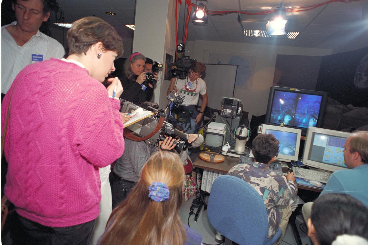 Life from other Worlds'  with McNair Middle School TROV robot explores under Antarctic ice-image during demo with students operating TROV
