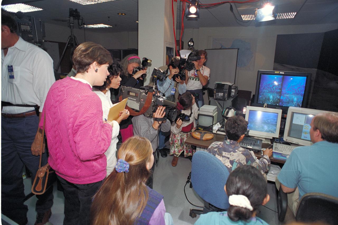 Life from other Worlds'  with McNair Middle School TROV robot explores under Antarctic ice-image during demo with students operating TROV