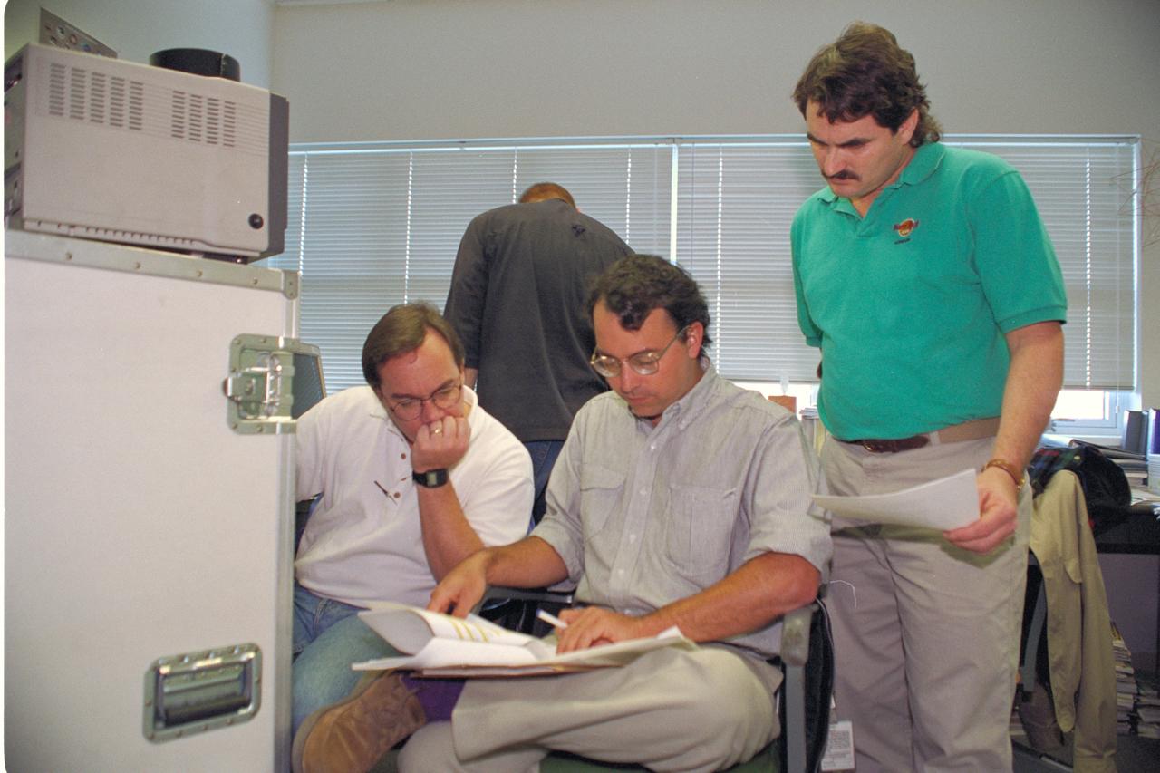 Life from other Worlds' with McNair Middle School TROV robot explores under Antarctic ice - image of Eric James, Ron Schutz, and Wade Sisler