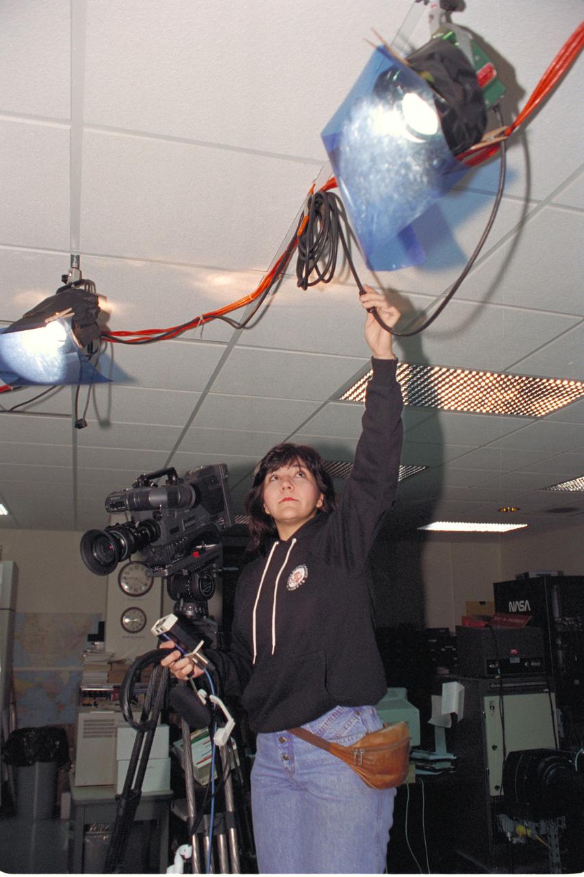 'Life from other Worlds' with McNair Middle School TROV robot explores under Antarctic ice - image shows Machelle Bowers during video set-up