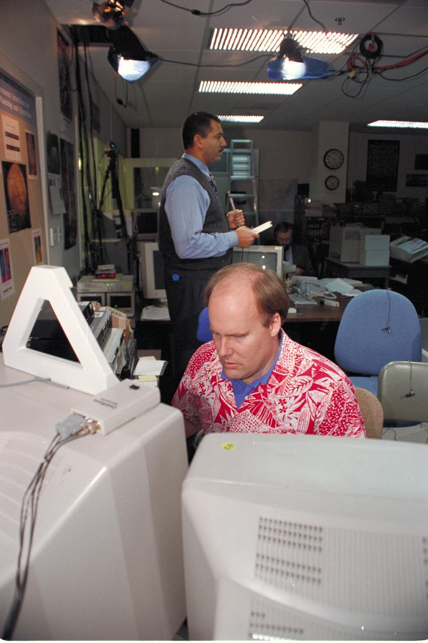 'Life from other Worlds' with McNair Middle School TROV robot explores under Antarctic ice - image shows Bob Hines, AMES scientist, operates TROV from AMES via telepresence