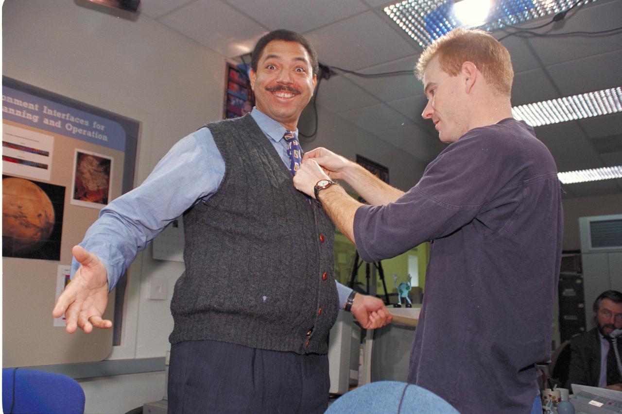 'Life from other Worlds' with McNair Middle School TROV robot explores under Antarctic ice - image of Don James and Jay Schiebe.