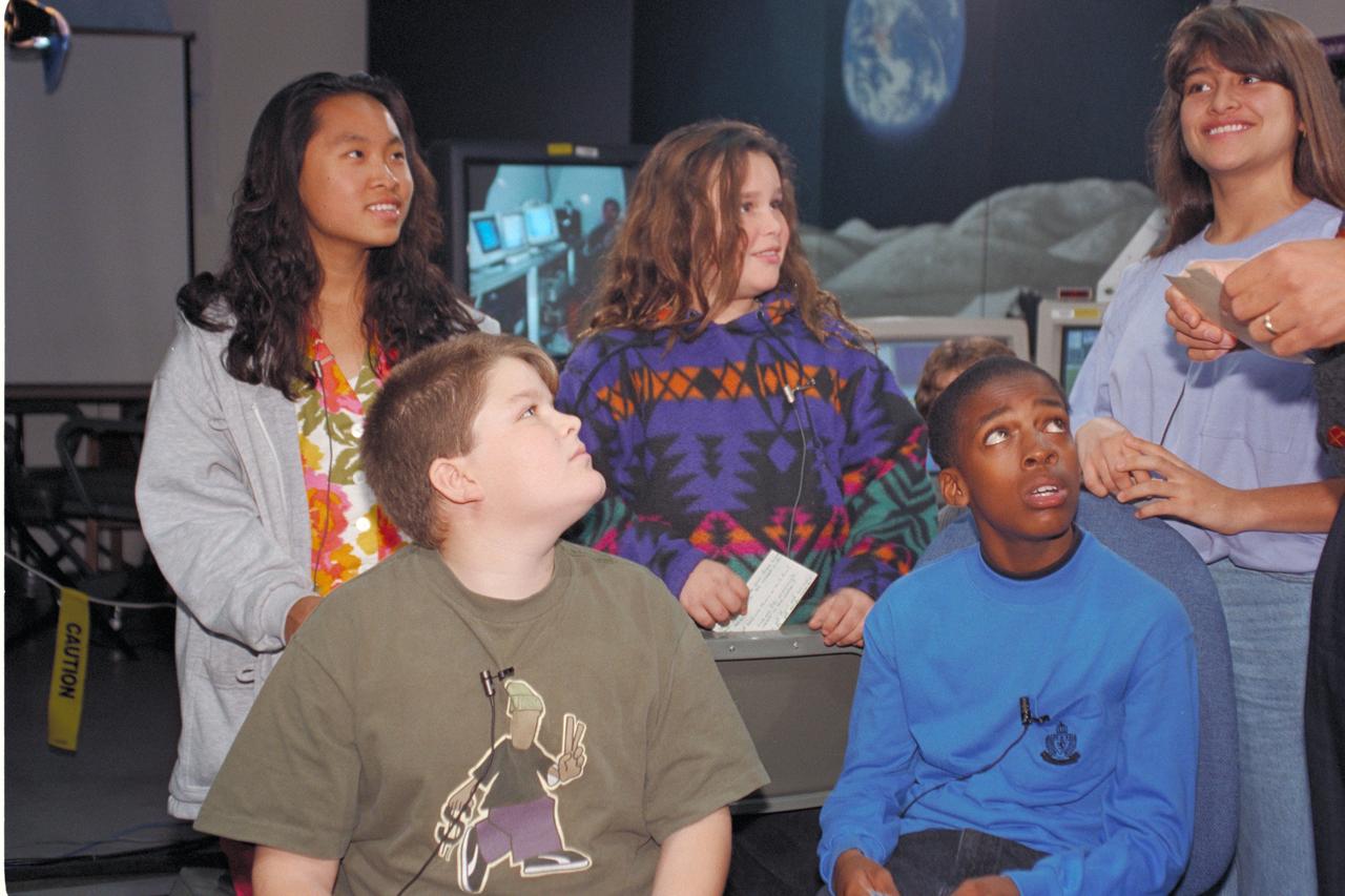 'Life from other Worlds' with McNair Middle School TROV robot explores under Antarctic ice - image of Don James with McNair kids