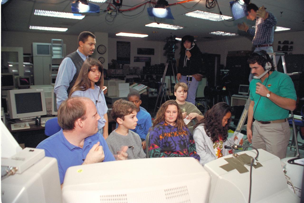 'Life from other Worlds' with McNair Middle School TROV robot explores under Antarctic ice - image during demo with students, Don James and Bob Hines.