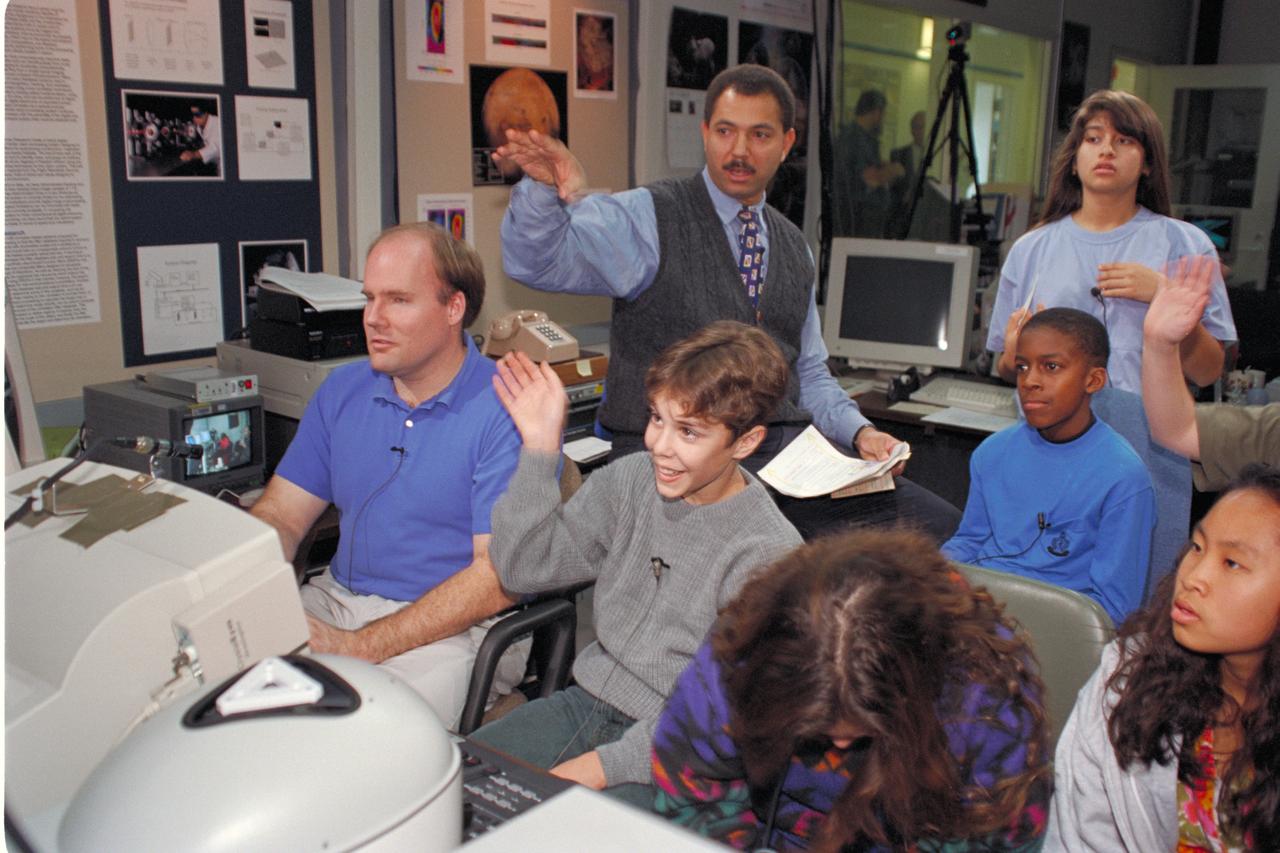'Life from other Worlds' with McNair Middle School TROV robot explores under Antarctic ice - image during demo with students, Don James and Bob Hines.