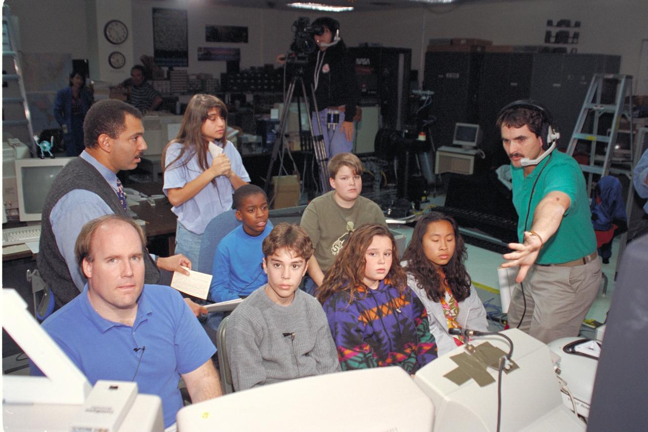 'Life from other Worlds' with McNair Middle School TROV robot explores under Antarctic ice - image during demo with students, Don James and Bob Hines.