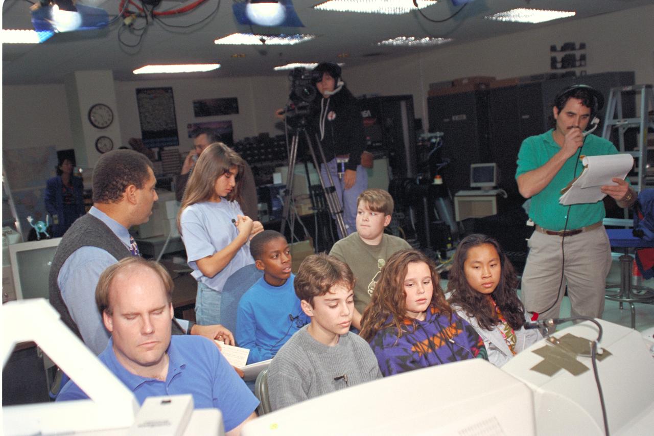 'Life from other Worlds' with McNair Middle School TROV robot explores under Antarctic ice - image during demo with students, Don James and Bob Hines.