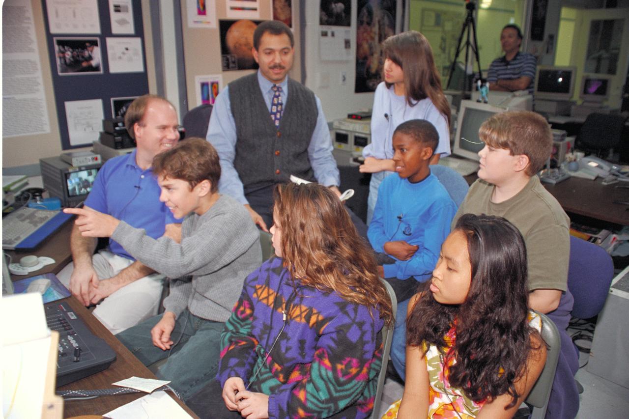'Life from other Worlds' with McNair Middle School TROV robot explores under Antarctic ice - image during demo with students, Don James and Bob Hines.