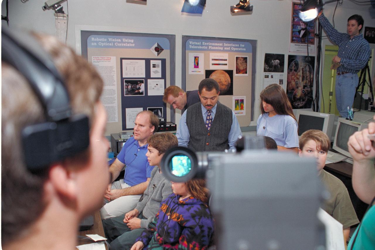 'Life from other Worlds' with McNair Middle School TROV robot explores under Antarctic ice - image during demo with students, Don James and Bob Hines.