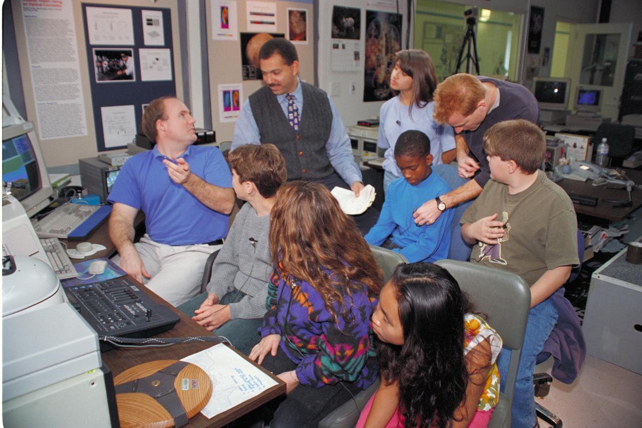 'Life from other Worlds' with McNair Middle School TROV robot explores under Antarctic ice - image during demo with students, Don James and Bob Hines.