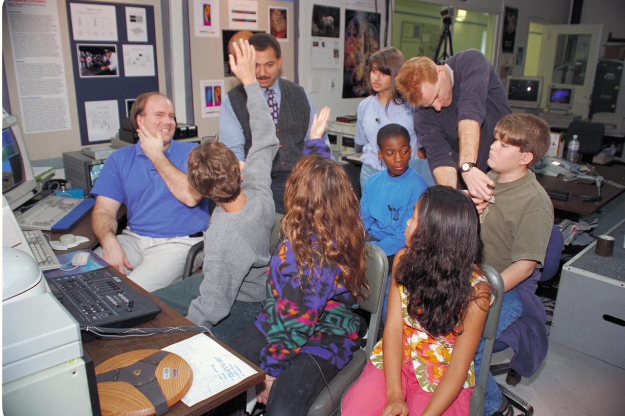 'Life from other Worlds' with McNair Middle School TROV robot explores under Antarctic ice - image during demo with students, Don James and Bob Hines.