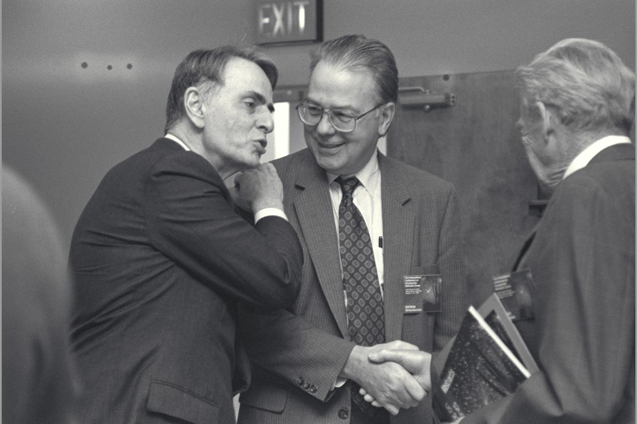 DR. CARL SAGAN WITH DR. DAVID MORRISON (AMES).  First International Conference on Circumstellar Habitable Zones.