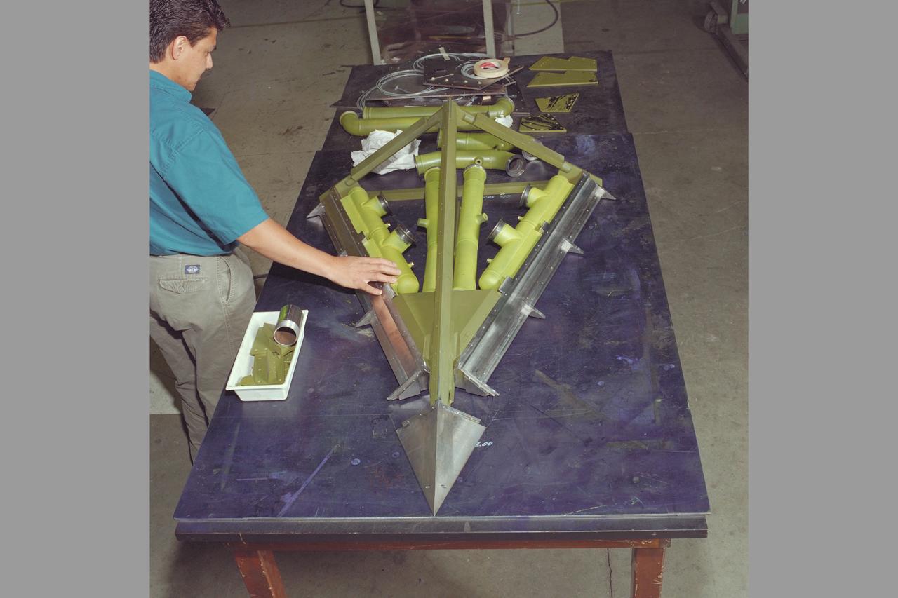 FLAC (USAF 55% Scale)  Model, Machine Shop N-220 . fitting wing panels (with Cesar Acosta)
