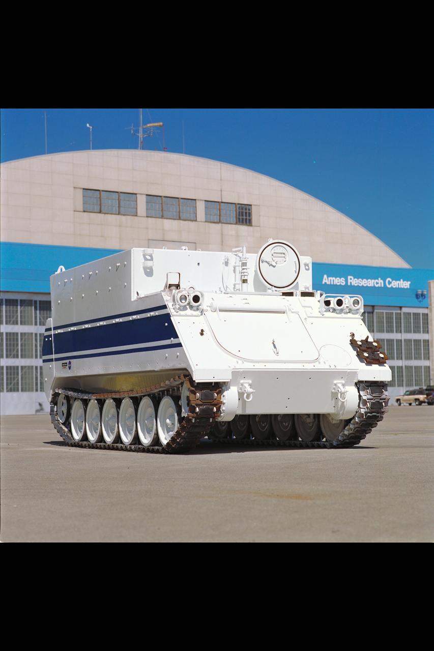 Armored Personnel Carrier (tank) arrives from FMC (Food Machinery Corporation) for transformation into a HAZMAT (Hazardous Materials) vehicle