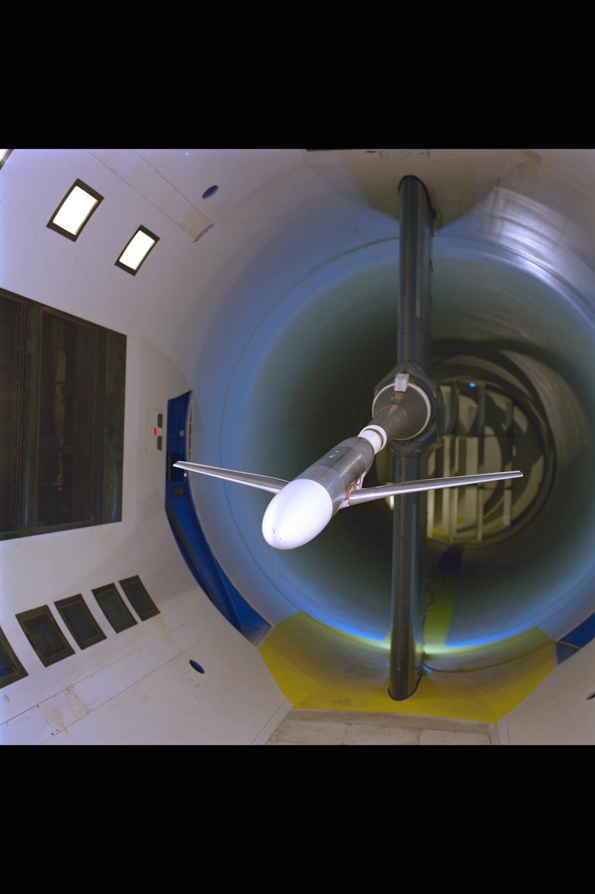 New renovated NASA Ames Research Center 12ft Pressure Wind Tunnel. View of test section with model LB-435 on RSS, showing lighting & viewing windows