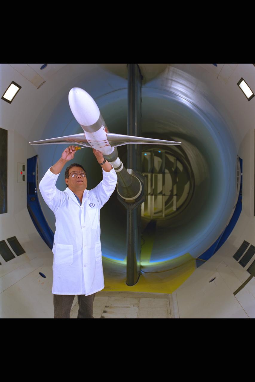New renovated NASA Ames Research Center 12ft Pressure Wind Tunnel view of test section with mechanic checking LB-435 model installed