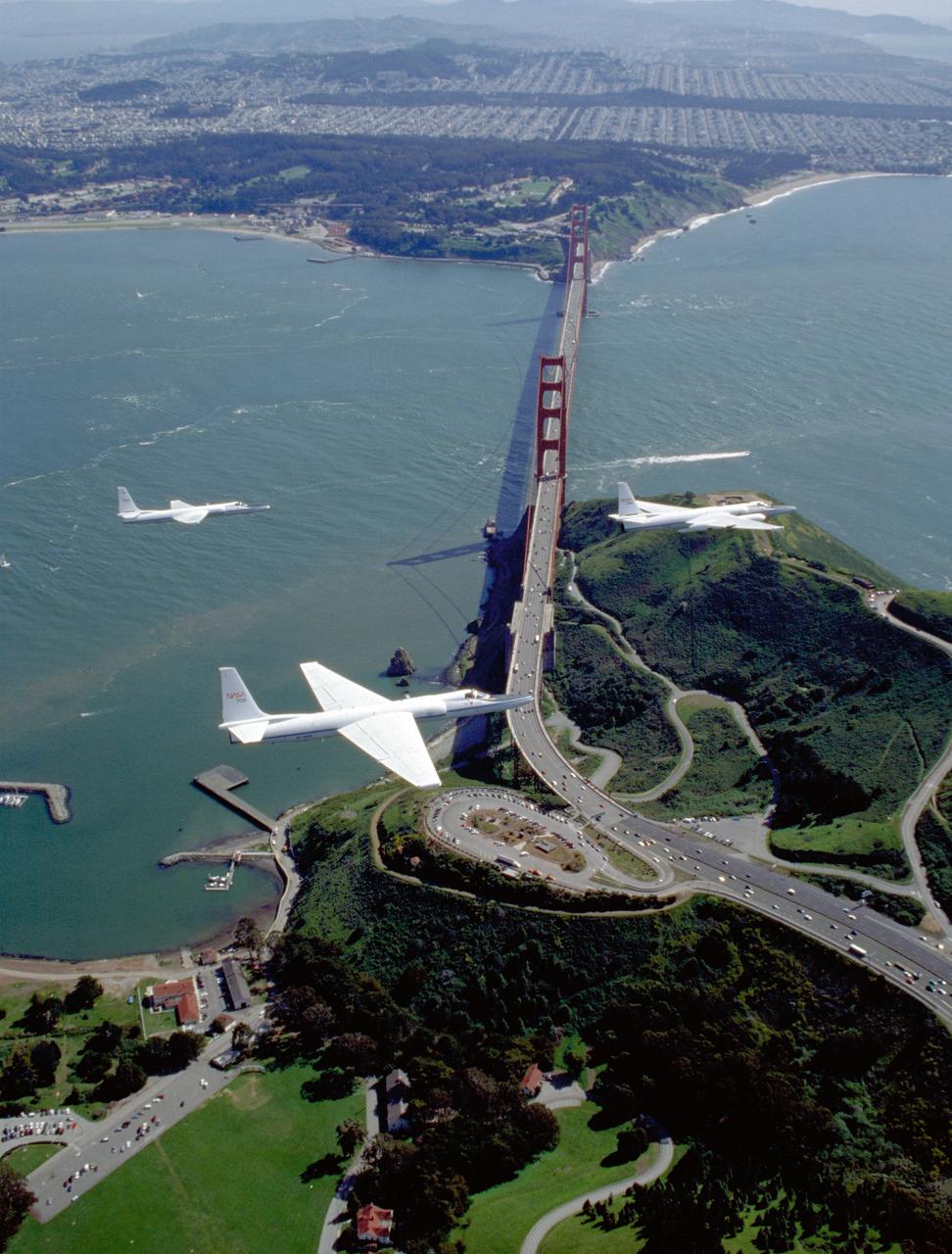 Three ER-2 Aircraft in formation over Golden Gate Bridge, San Francisco, CA on their final flight out of NASA Ames Research Center before redeployment to NASA's Dryden Flight Research Center, CA