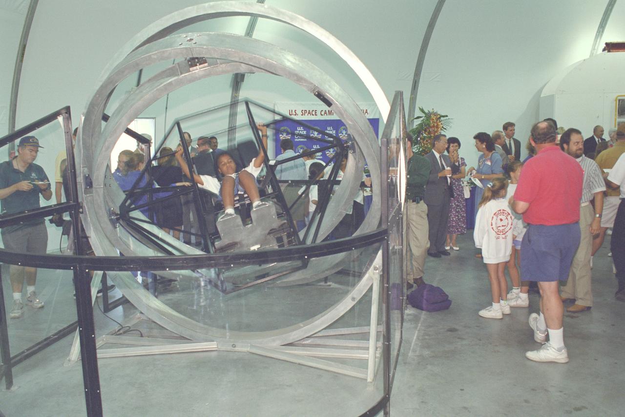 U.S. Space Camp California 'Day Camp' Grand Opening student tries out gyro chair