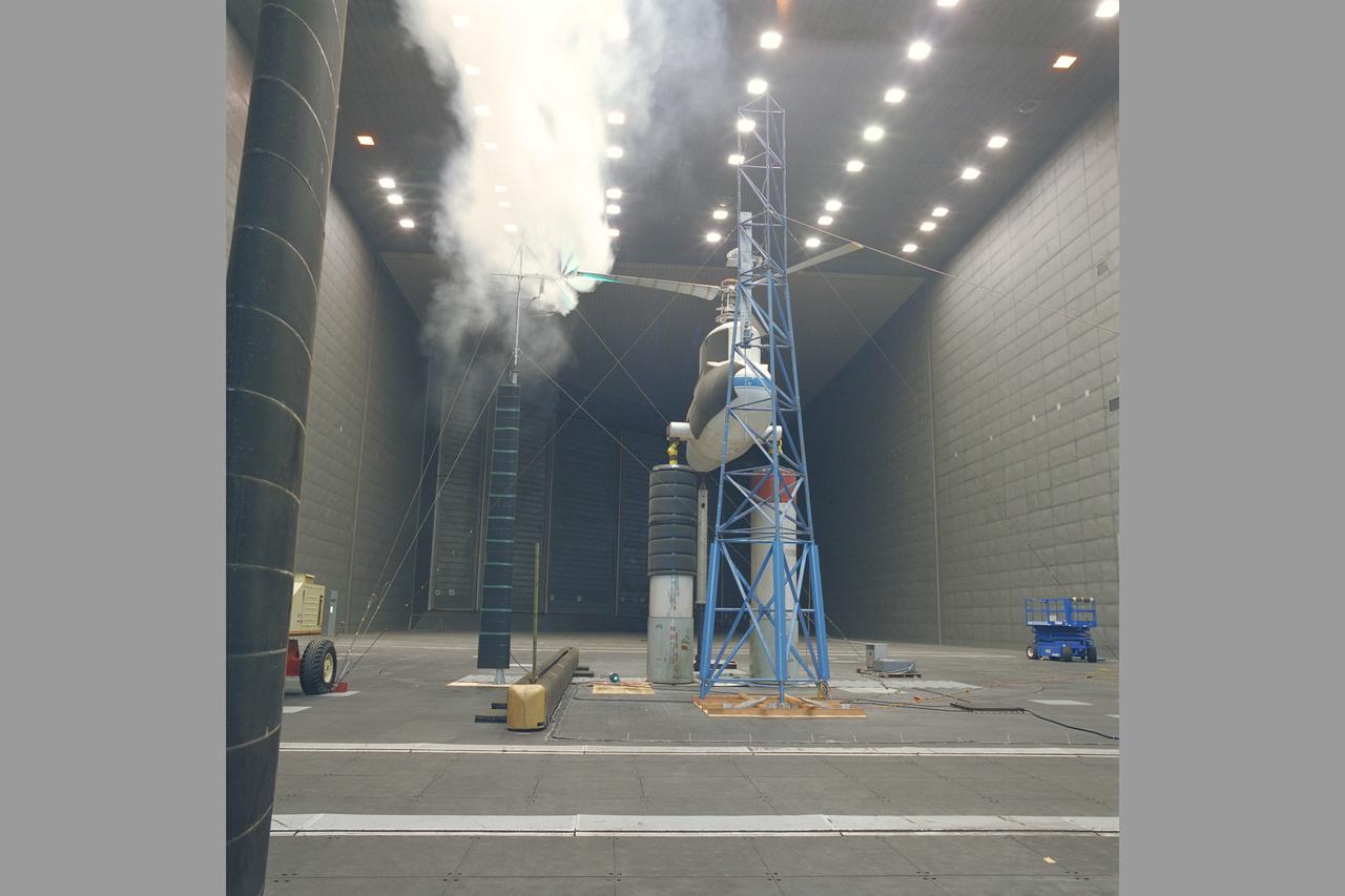 XV-15 Rotor Test Apparatus (RTA) flow visualization Hover test-80-0021 in 80x120ft w.t.