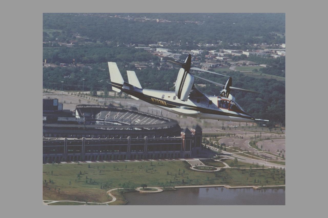 XV-15 (N703NA) Tiltrotor in hover - conversion flight at Bell Helicopter Co. Bell Photo number 043443