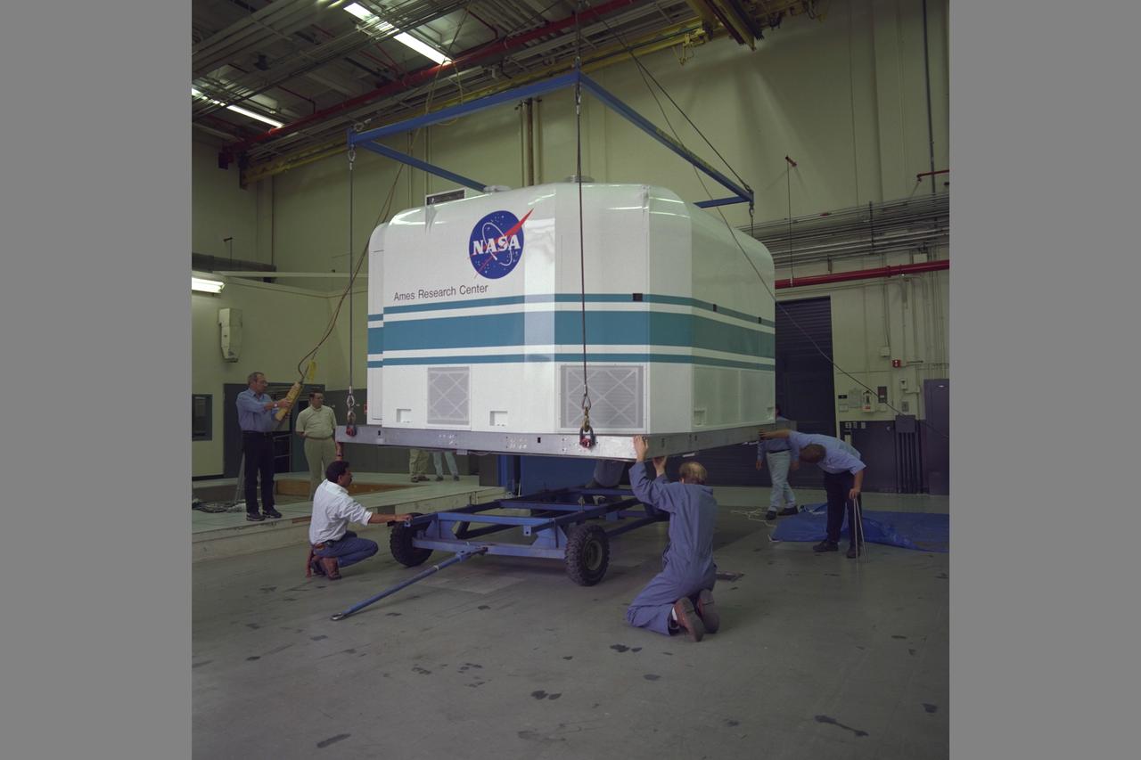 Tiltrotor Aircraft, Transport Aircraft T-Cab moving into NASA Ames Vertical Motion Simulaotor (VMS) from I-Cab Fixed Base Area in bldg. N-243 using trolly.