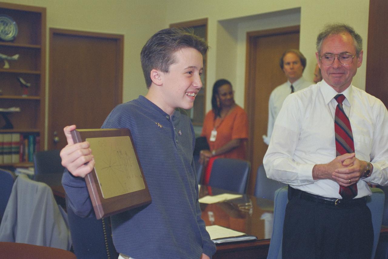 Make a wish foundation VMS ride for Tom Evans. Tom receives a Pioneer 10 Plaque from Dr McDonald at a meeting attended by Shelia Johnson, organizer of the wish.