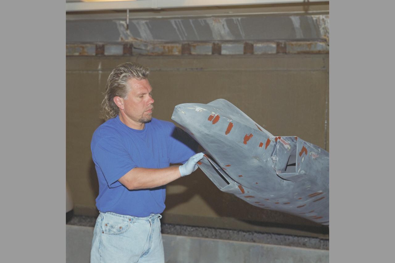 Manufacturing Division (Code JM) Projects. Ron Hovland working on X-36 model in N-212, Model Development & Advanced Composites Br (Code JMC)