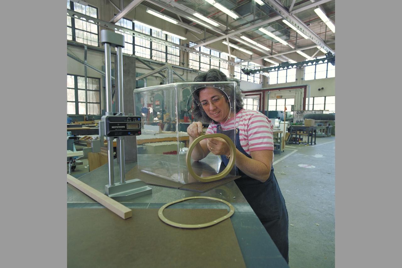 Manufacturing Division (Code JM) Projects. Susan Suffel working on AEM (Animal Enclosure Module) in N-212, Model Development & Advanced Composites Br. (Code JMC)