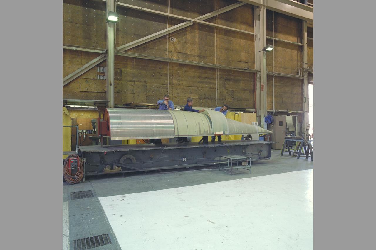 Manufacturing Division (Code JM) Projects. Damon Flausburg, Mike Guerrero & Tom Glibertson working on STAR model in N-246; Metal Fabrications Br (Code JMF)