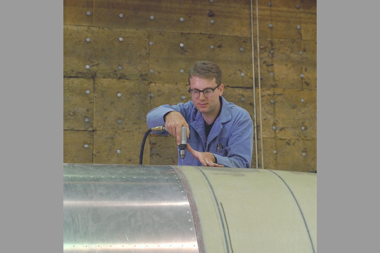 Manufacturing Division (Code JM) Projects. Damon Flausburg working on STAR model in N-246 Metal Fabrications Br. (code-JMF)