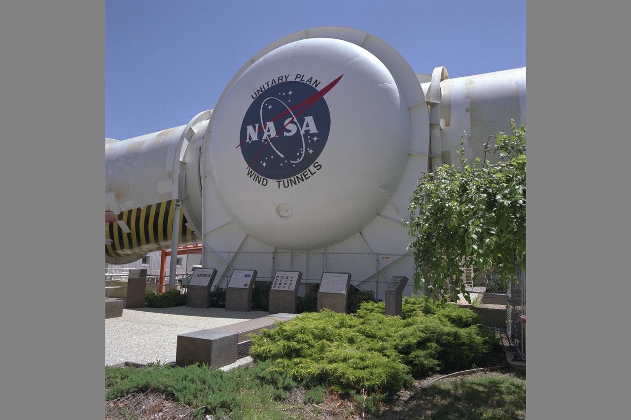 Unitary Plan Wind Tunnel N-227 (new)  NASA Logo with Unitary International Historic Mechanical Engineering Landmark commemorative plaques in front. Date: June 16, 1998 Photographer: Tom Trower