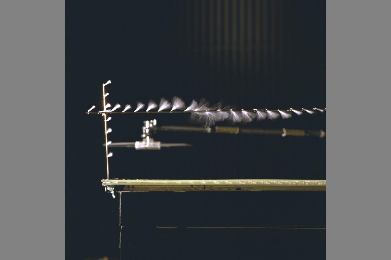 Ship Airwake investigation 7x10FT#2 W.t. settling Chamber. Shows test setup and model flow visuaization using microtufts and UV ilumination