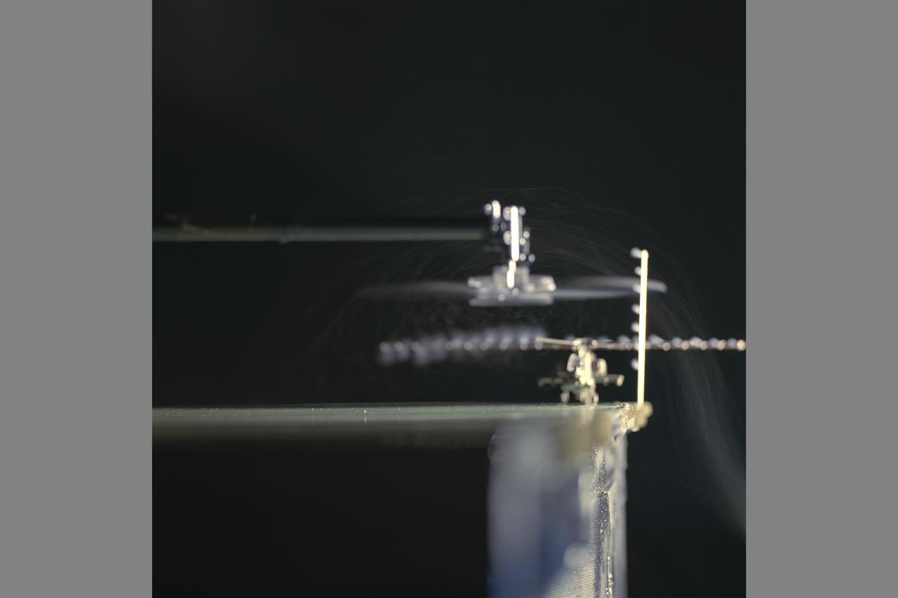 Ship Airwake investigation 7x10FT#2 W.t. settling Chamber. Shows test setup and model flow visuaization using microtufts and UV ilumination