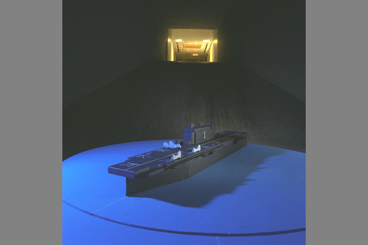 Test Setup and UltraViolet (UV) Lighting and Tufts.  Ship Airwake Investigation 7 x 10 ft#2 Wind Tunnel Settling Chamber. Bridge and rotorcraft added to flight deck