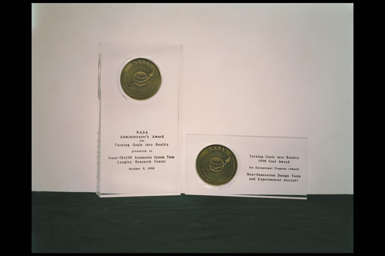 Administrator award (two) Center-Tracon Automation system Team Langley Res. CTR and Goal Award 1998, Next-Genreation Design Tools and Experimental Aircraft- acrylic