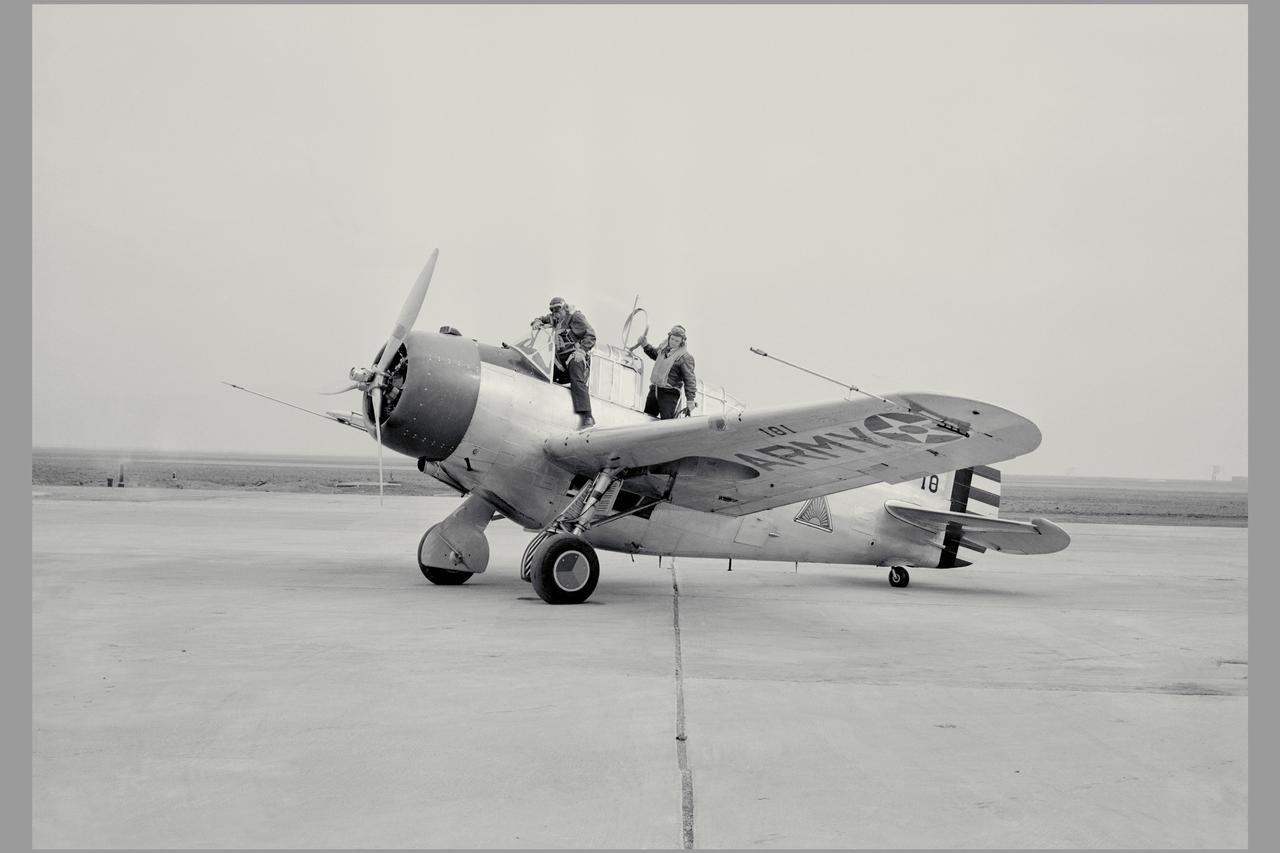 W.H. MCAVOY AMES TEST PILOT RETURNING FROM AN EARLY FLIGHT OF FIRST TEST AIRPLANE AT AMES, A NORTH AMERICAN O-47
