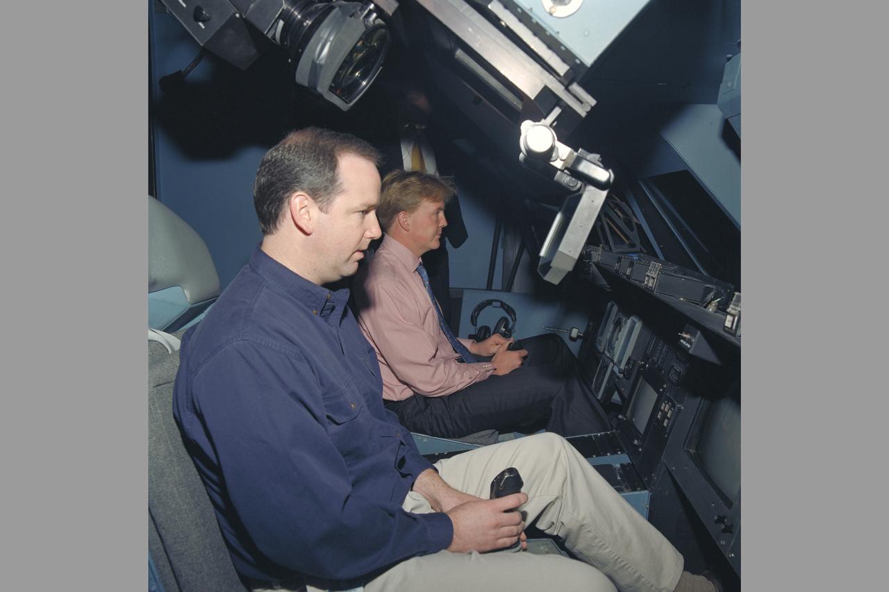 Prince Willem-Alexander van Oranje (Crown Prince of the Netherlands) visits Ames. Shown here with Chris Sweeney (Ames) as he explains the control in the VMS S-cab