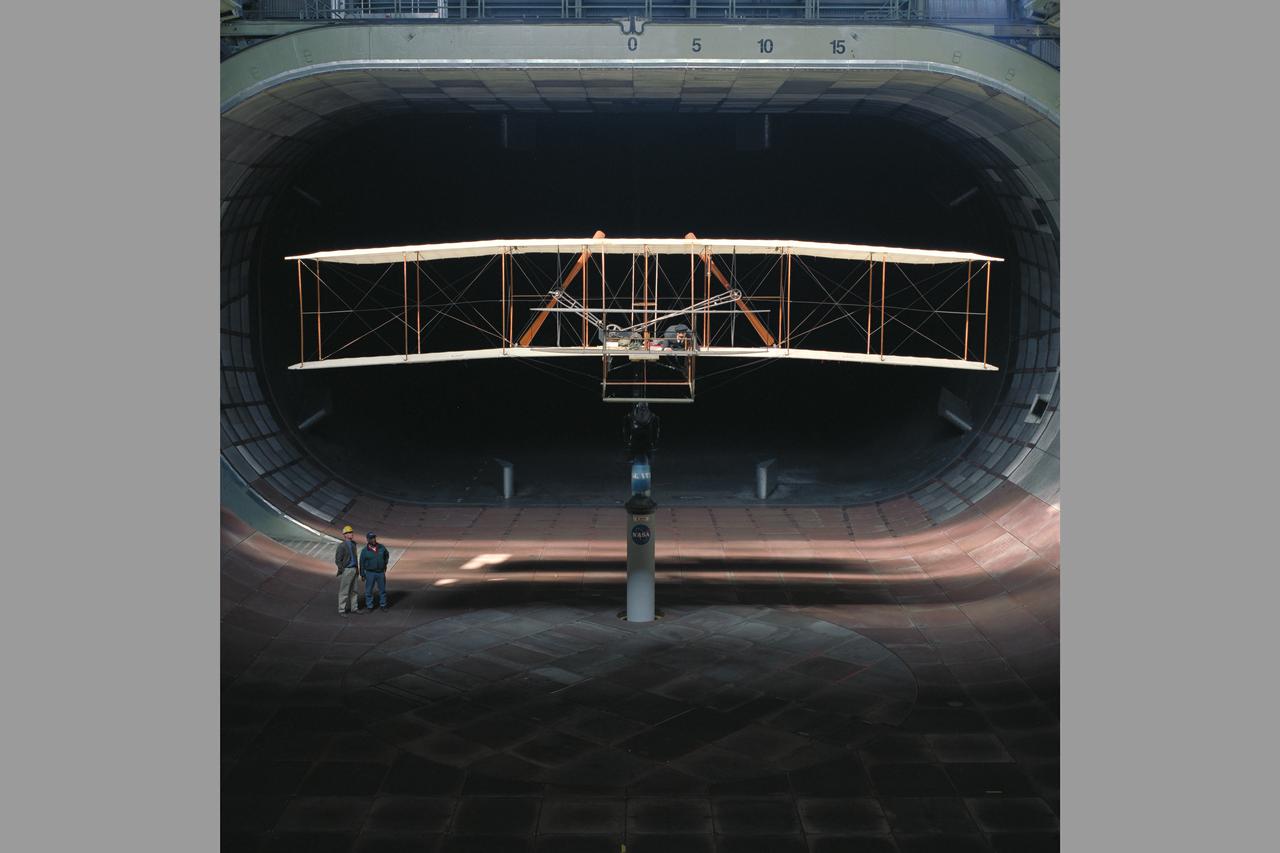 Wright Flyer Replica Test-40-0047:  Ames 40 x 80 foot Subsonic  Wind Tunnel. Shown here with Pete Zell, Ames test engineer.  (Testing of the replica for it's airworthiness was as part of the Centennial of Flight celebration.)