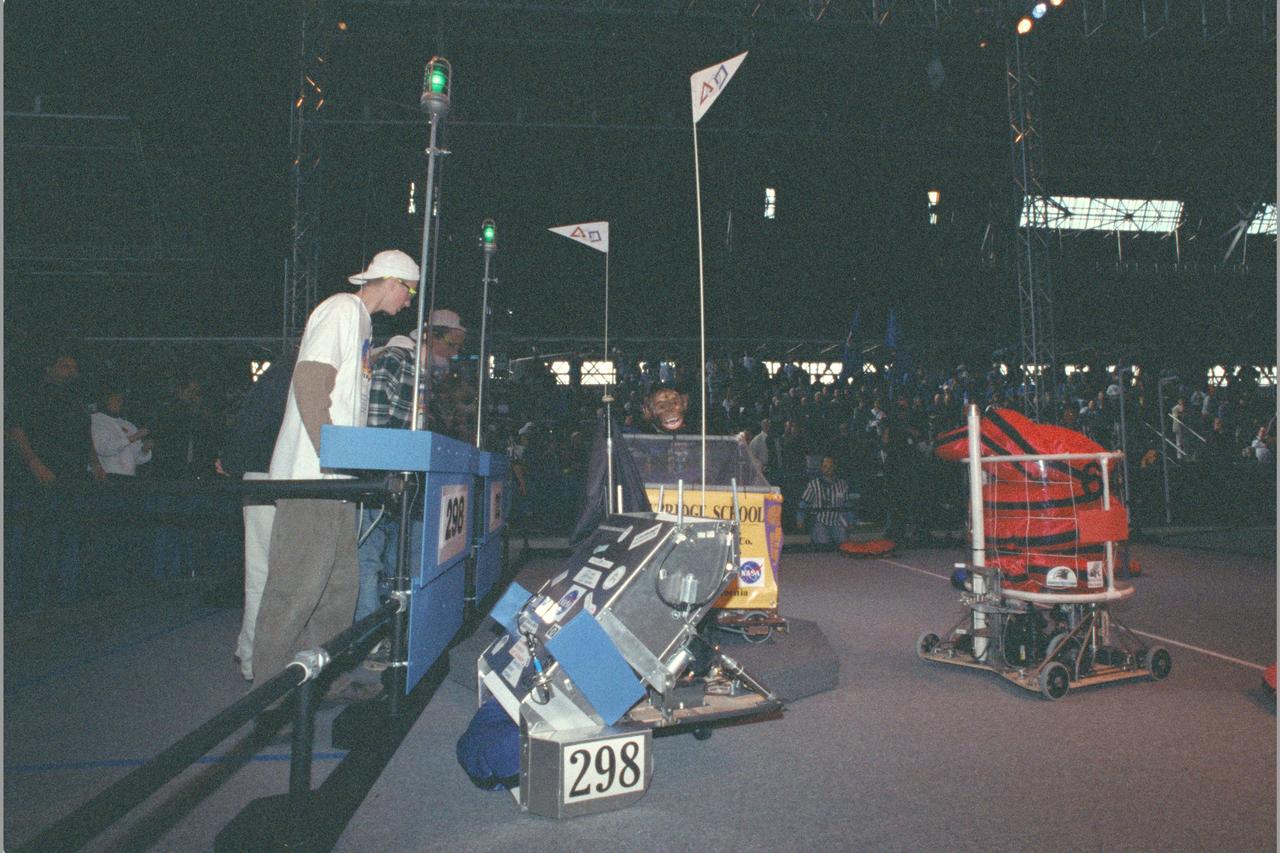 NASA AMES sponsored  FIRST (Inspiration and Recognition of Science and Technology) Western Regional Robot Games Student competition in Hangar robots compete during 2 minute matches